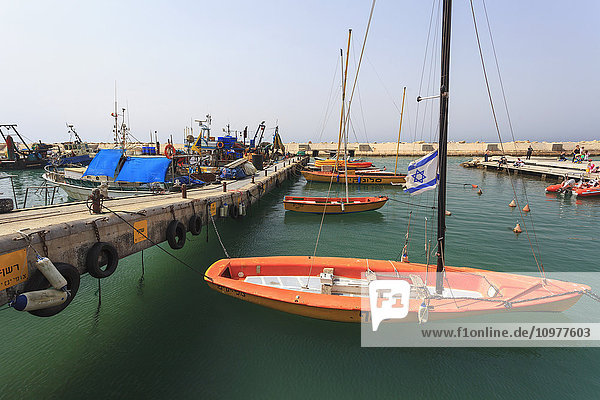 'Boats in the turquoise water in the harbour; Joppa  Israel'