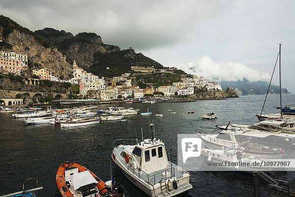 'Fishing boats mooring in the harbour along the Amalfi coast; Amalfi  Campania  Italy'