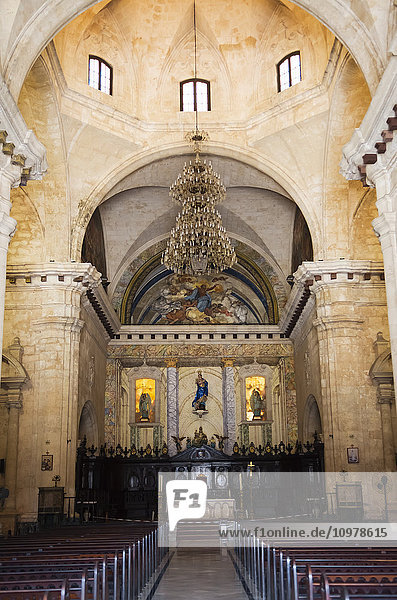 'Interior of a Cuban catholic church with pews and an altar; Havana  Cuba'