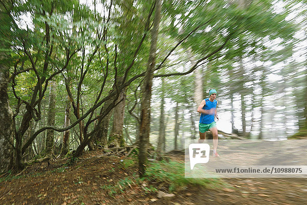 Caucasian man running at Mount Daibosatsu  Yamanashi Prefecture  Japan