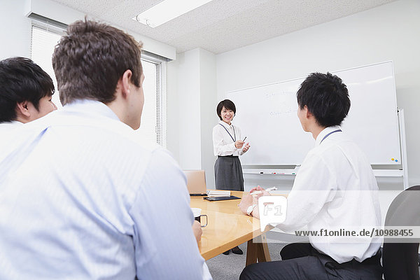 Multi-ethnic business people in a meeting room