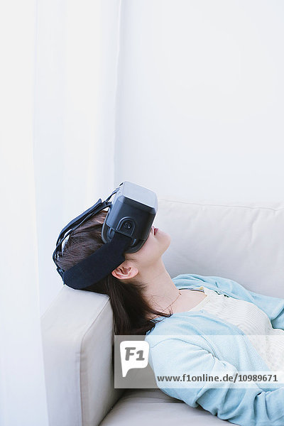 Japanese woman using virtual reality device
