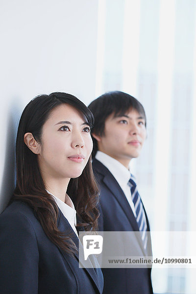 Japanese businesspeople in a modern office