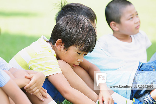 Japanese kid in a city park
