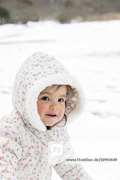 Kid playing on snow