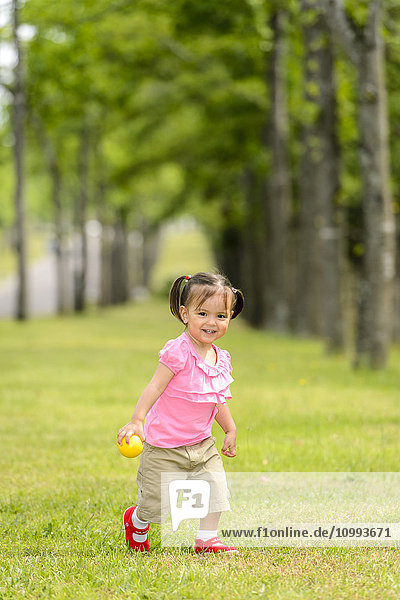Kid playing in a city park