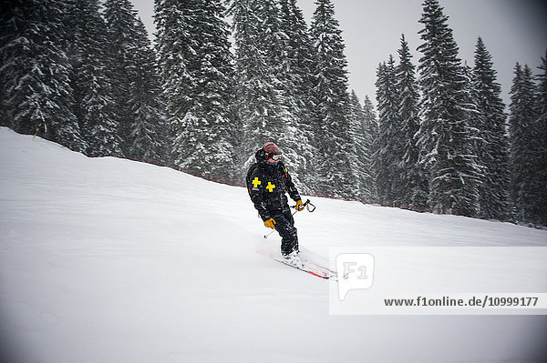 Reportage with a ski patrol team at the Avoriaz ski resort in Haute Savoie  France. The team are responsible for marking out the ski slopes  providing first aid to skiers  evacuations on the slopes as well as off piste and controlled avalanches.