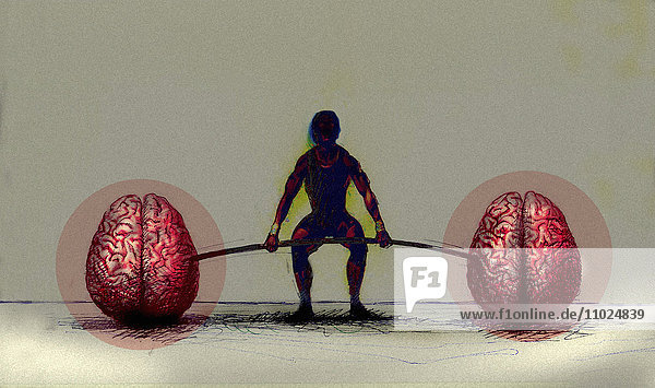 Mann trainiert mit einer Gehirn-Hantel