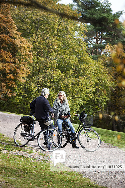 Senior couple cycling  Delsjon  Gothenburg  Sweden