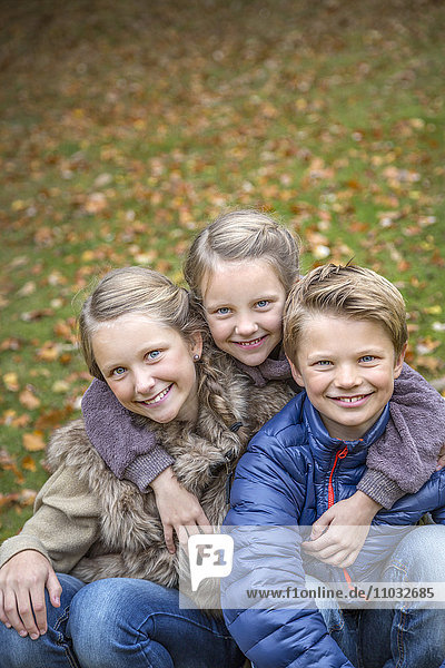 Smiling siblings together  Karlskrona  Blekinge  Sweden