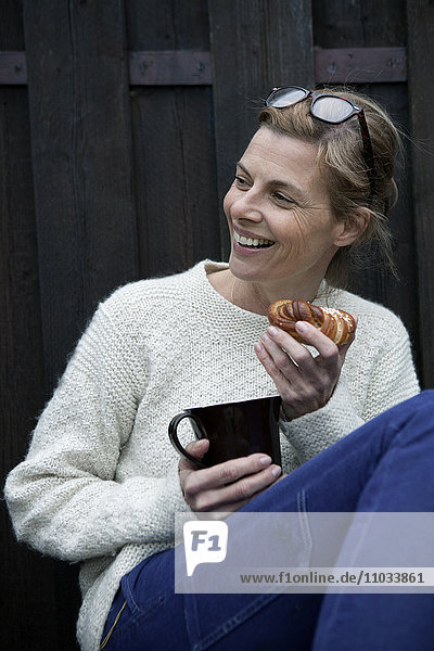 Portrait of mature woman during coffee break