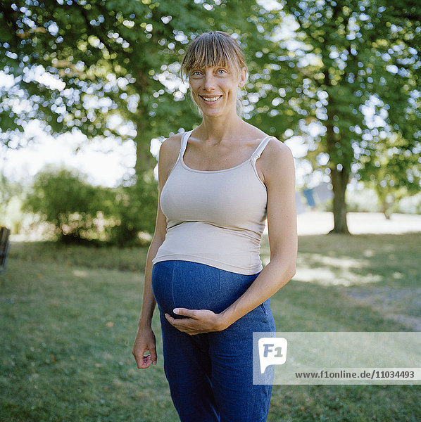 Portrait of a pregnant woman.