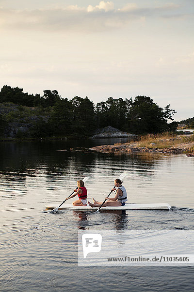 Two sisters kayaking
