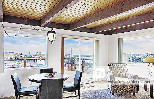 Dining table and armchair in modern living room