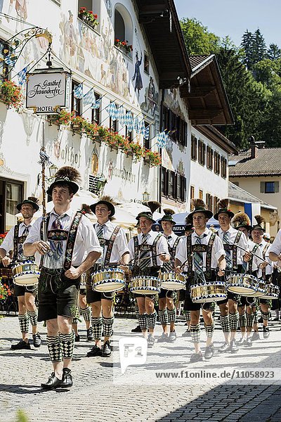 Parade marching band  traditional costume parade  Garmisch-Partenkirchen  Upper Bavaria  Bavaria  Germany  Europe
