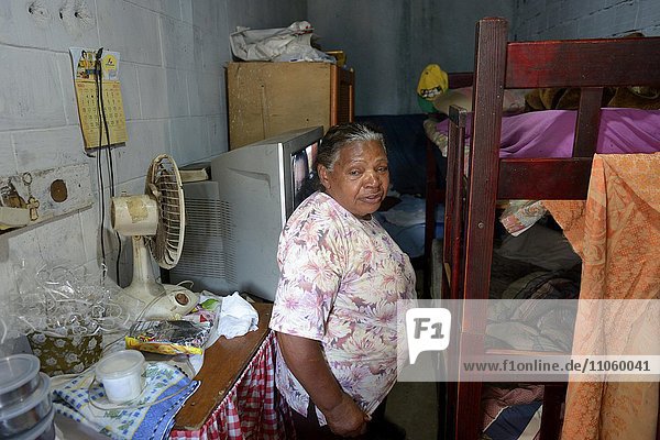 Old woman in her hut  slum Favela 21 de Abril  São Paulo  Brazil  South America