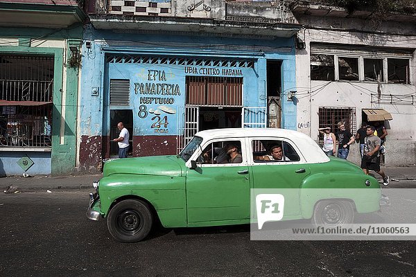 Street scene  green vintage car  historic centre  Havana  Cuba  North America