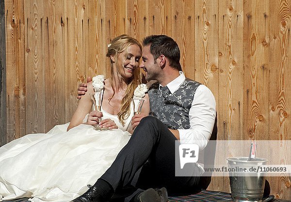 Wedding couple celebrating with champagne  Austria  Europe
