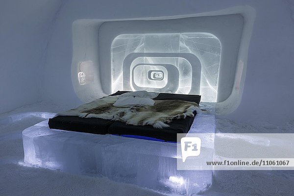 Bed with reindeer skins  Love Capsule suite  designed by Luc Voisin and Mathieu Brison  Icehotel  Jukkasjärvi  Norrbotten County  Sweden  Europe