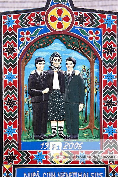 Tombstone of a mother showing her with her sons  The Merry Cemetery  Cimitirul Vesel  S?pân?a  Maramares  Northern Transylvania  Romania  Europe