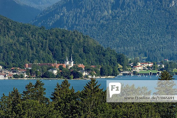 View over Lake Tegernsee on the monastery of the city Tegernsee  Upper Bavaria  Bavaria  Germany  Europe