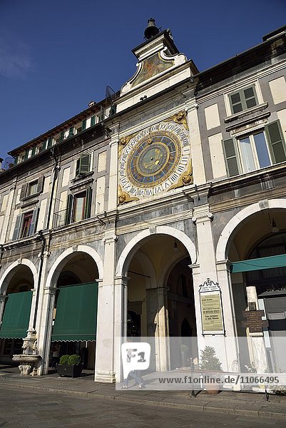 Clock tower with historical astronomical clock  Piazza della Loggia  Province of Brescia  Lombardy  Italy  Europe