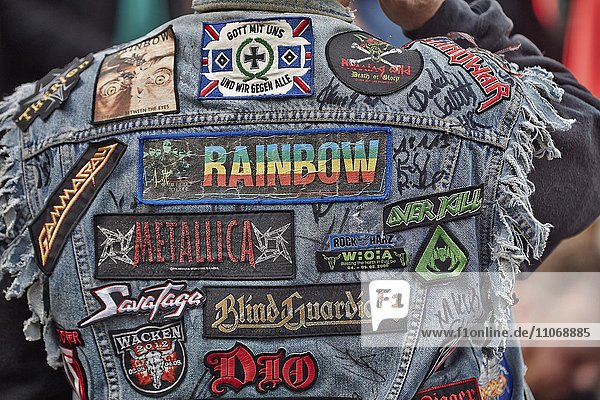 Visitor with patches on jacket rear view Monsters of Rock hard rock festival Sankt Goarshausen Rhineland-Palatinate Germany Europe