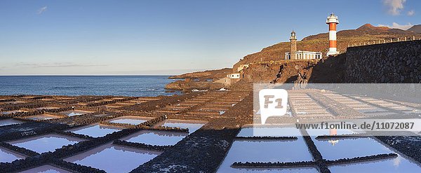 Saltworks Teneguia in front of Faro de Fuencaliente lighthouse Punta de Fuencaliente La Palma Canary Islands Spain Europe