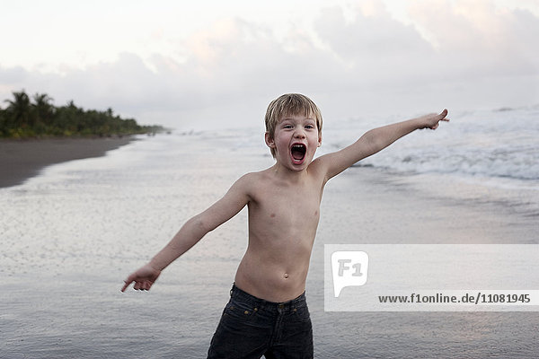 Boy playing on beach