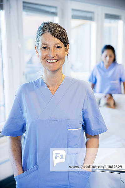 Portrait of smiling doctor in hospital