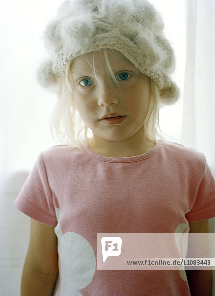 Portrait of girl wearing knit hat