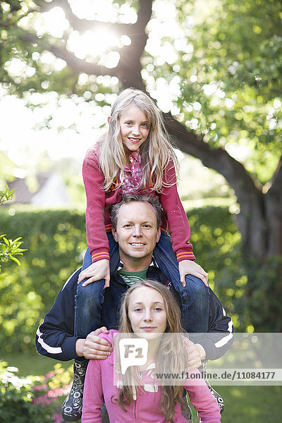 Father with two daughters  Stockholm  Sweden