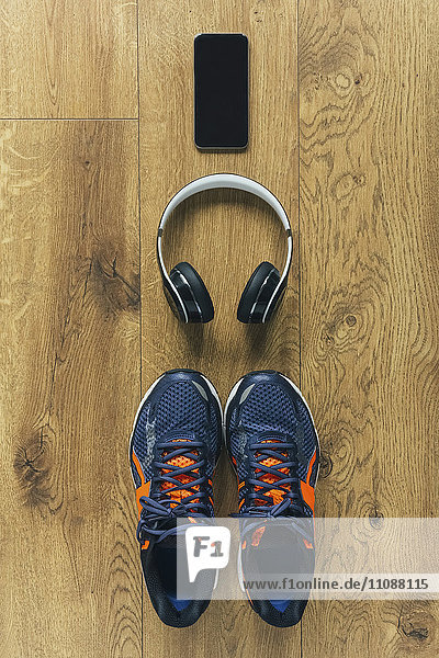 Running shoes  headphones  smartphone