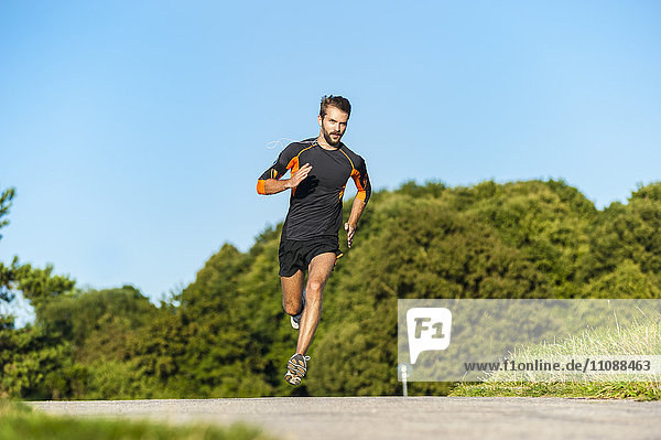 Man running on rural path