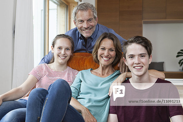 Portrait of happy family at home