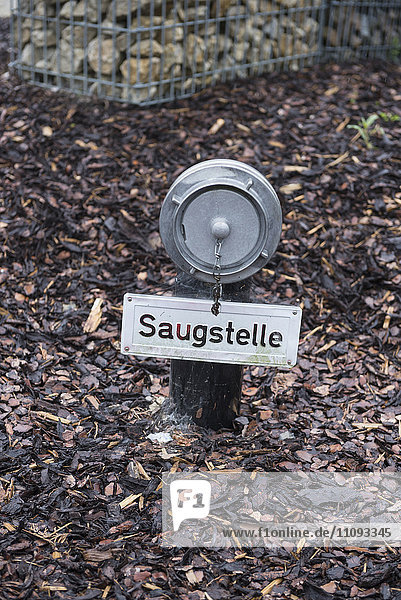 Fire hydrant in garden centre Augsburg Bavaria Germany