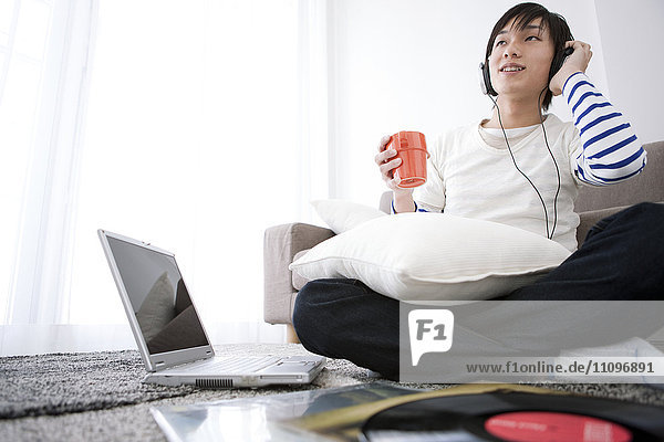 Young Man Listening To Music