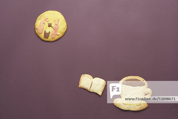 Cookies of rabbits on moon coffee and book