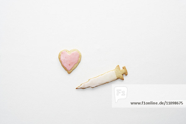Cookies of heart and syringe