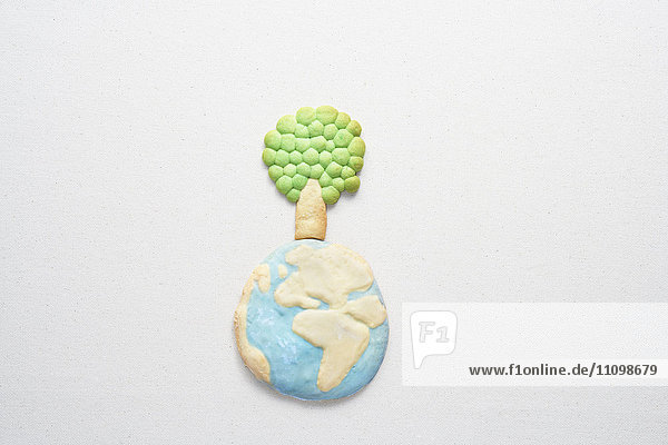 Cookies of planet earth and tree
