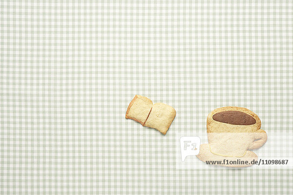 Cookies of book and coffee cup