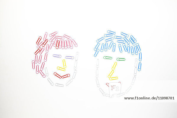 Woman and man made out of paper clips
