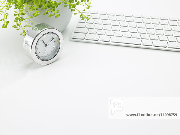Computer keyboard and clock