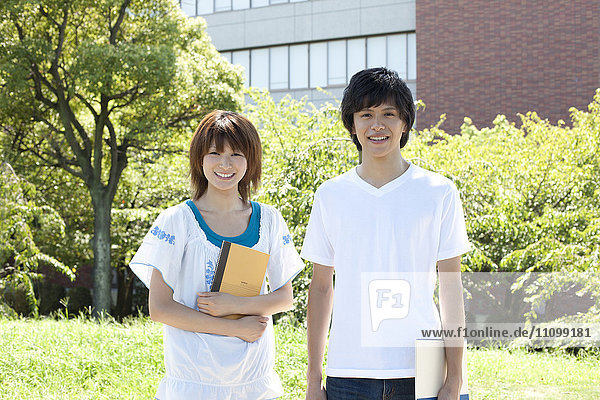 Two students standing outside