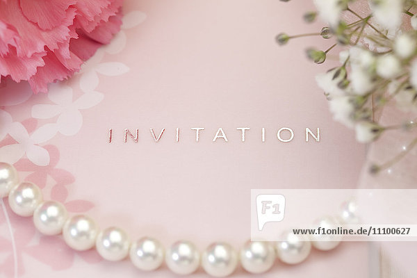 Invitation With Flower and Necklace