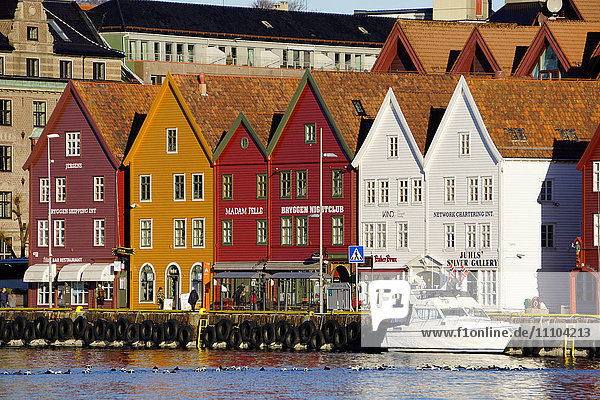 Traditional wooden Hanseatic merchants buildings of the Bryggen  UNESCO World Heritage Site  in harbour  Bergen  Hordaland  Norway  Scandinavia  Europe