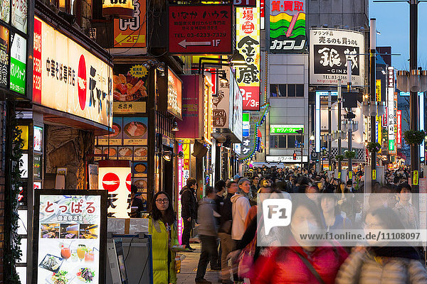 A crowded street at night in the Ginza district of Tokyo  Japan  Asia