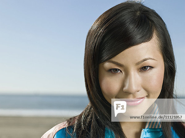 Nahaufnahme einer lächelnden asiatischen Frau