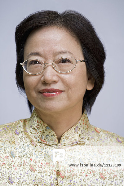 Close up of Asian woman in eyeglasses