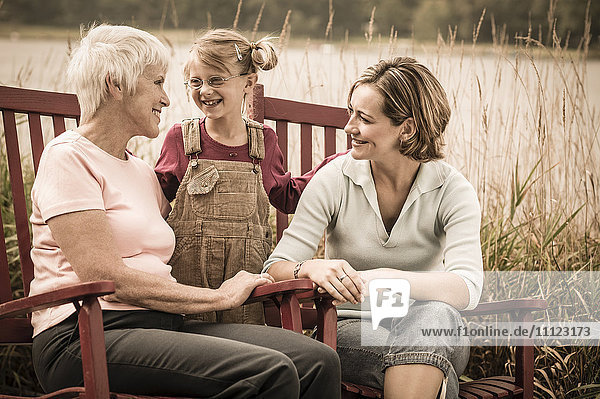 Three generations of Caucasian women smiling